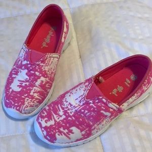 Girls slip on pink shoes
